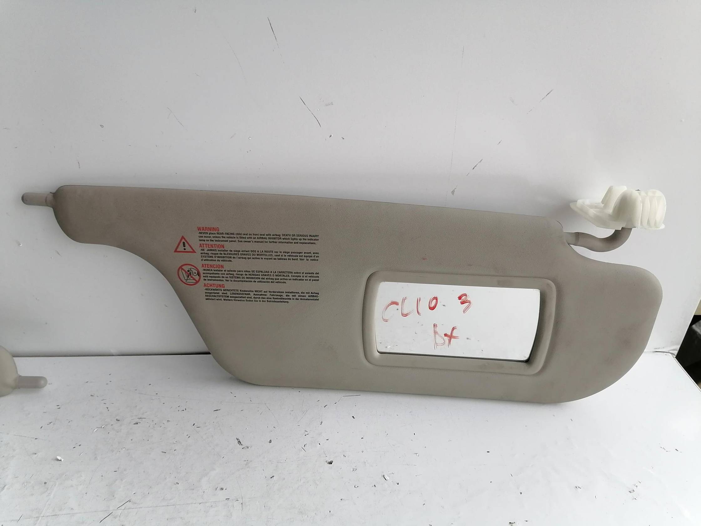 Aletta parasole parabrezza dx.